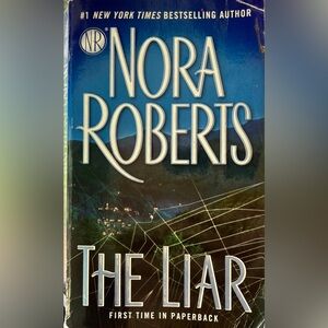👍 Free with Purchase OR 2/$15 “The Liar” by Nora Roberts paperback